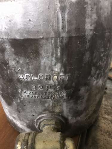 A cast iron Aga urn with brass tap by Holcroft