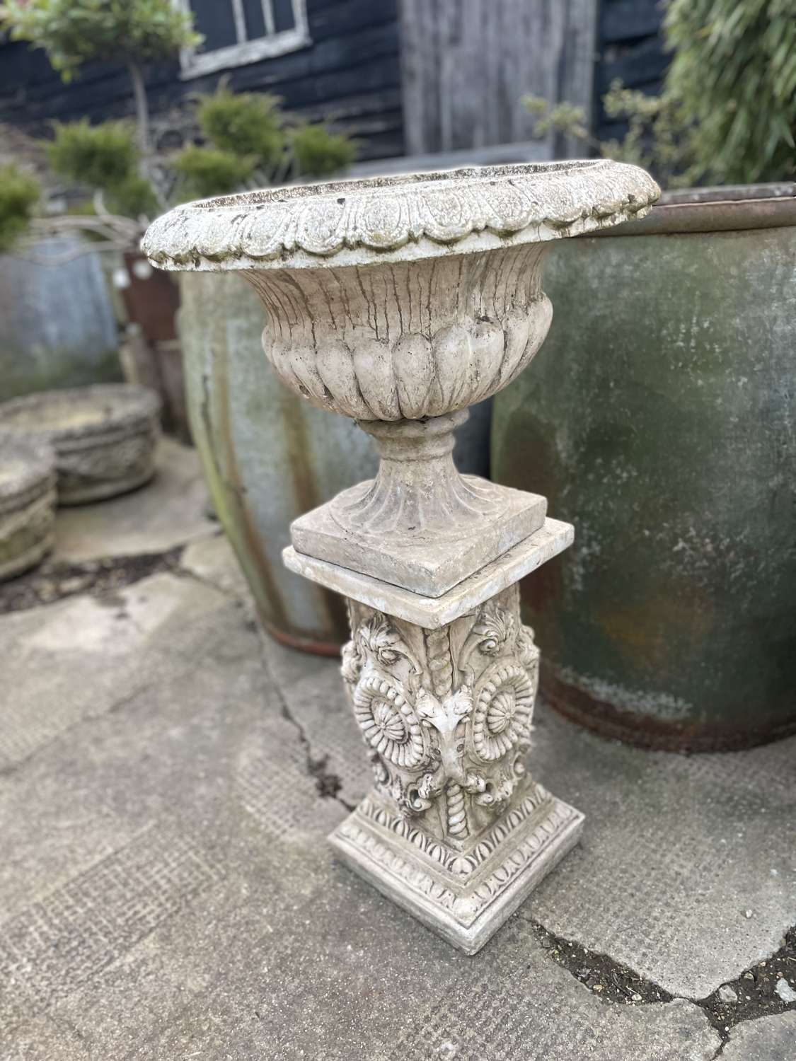Garden Urn on decorative plinth