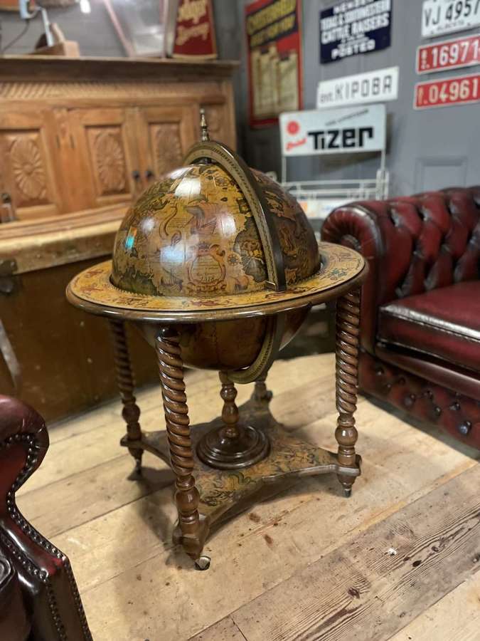A vintage French drinks globe