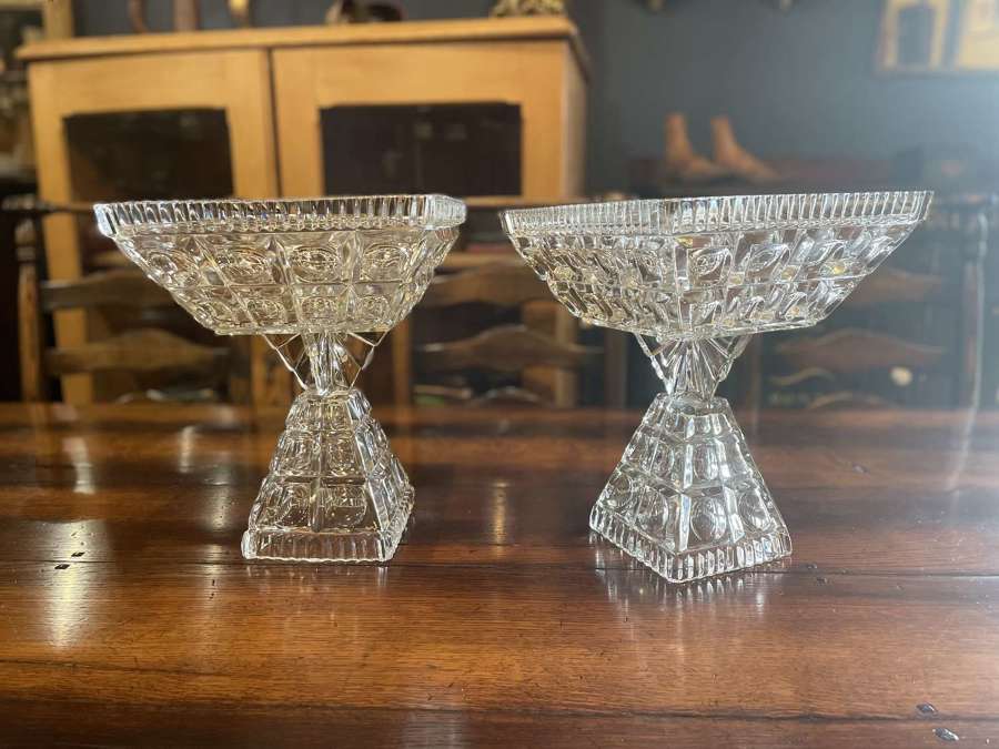 A pair of Art Deco clear glass table centrepiece