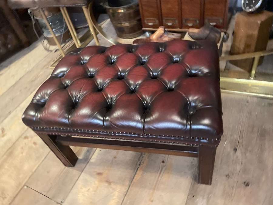 Oxblood leather Chesterfield footstool with Georgian style legs