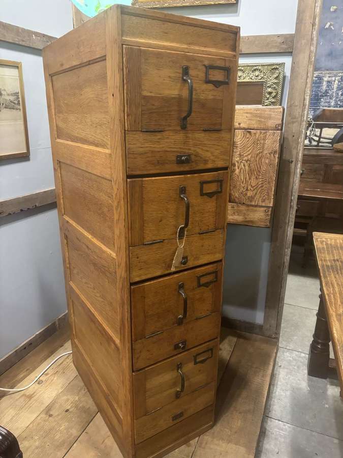 Antique oak 4 drawer filing cabinet with panelled sides and top