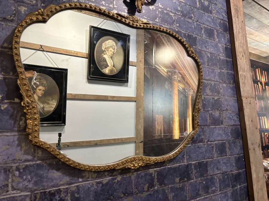 Art deco Shaped Wall Mirror in Embossed Gilt Frame