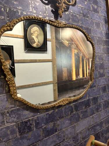 Art deco Shaped Wall Mirror in Embossed Gilt Frame
