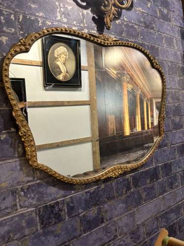 Art deco Shaped Wall Mirror in Embossed Gilt Frame