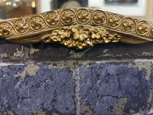 Art deco Shaped Wall Mirror in Embossed Gilt Frame