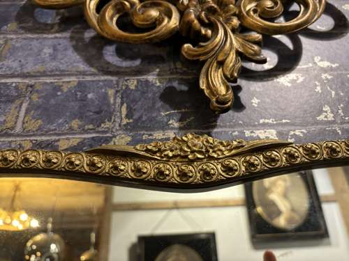 Art deco Shaped Wall Mirror in Embossed Gilt Frame