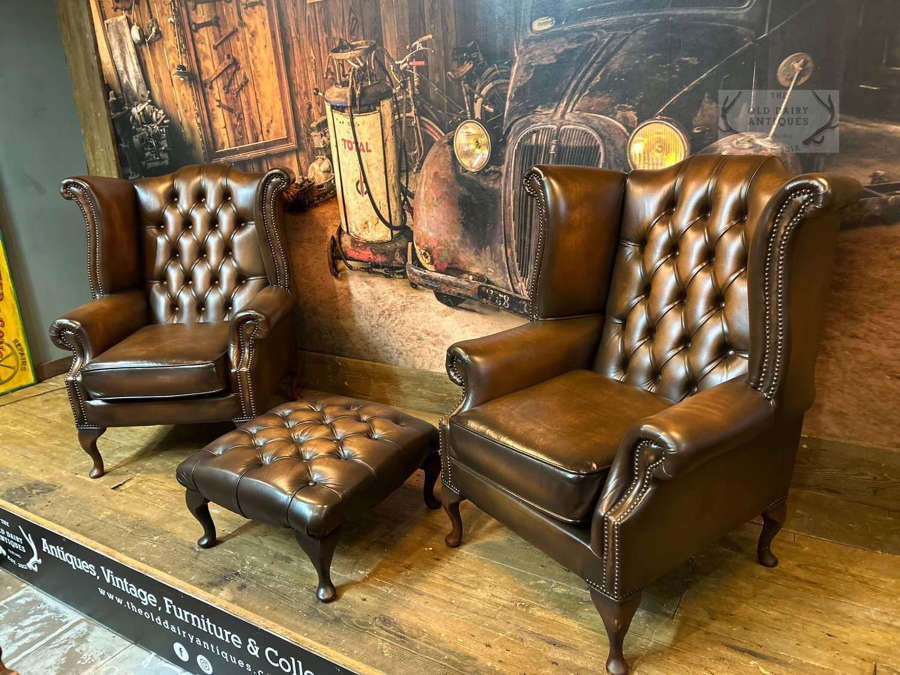 Pair of Antique Tan Leather Chesterfield Wing Chairs & Footstool