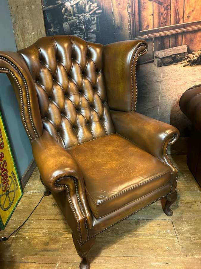 Antique Tan Chesterfield Wing Armchair