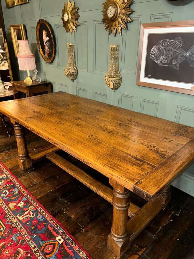 Solid oak refectory dining table. Seats up to 8.